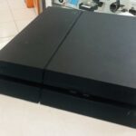USED Sony PlayStation 4 With Games and Pad